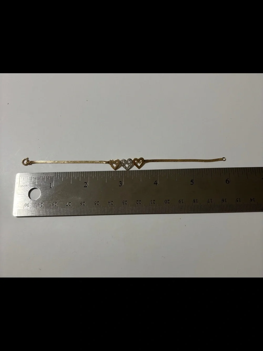 14k Gold Three Heart with diamond Center Bracelet